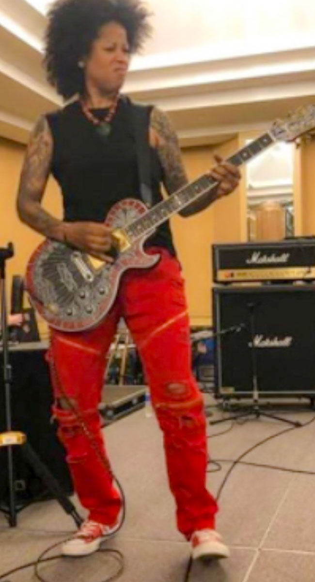 BIBI MCGILL Playing a TEYE Guitar