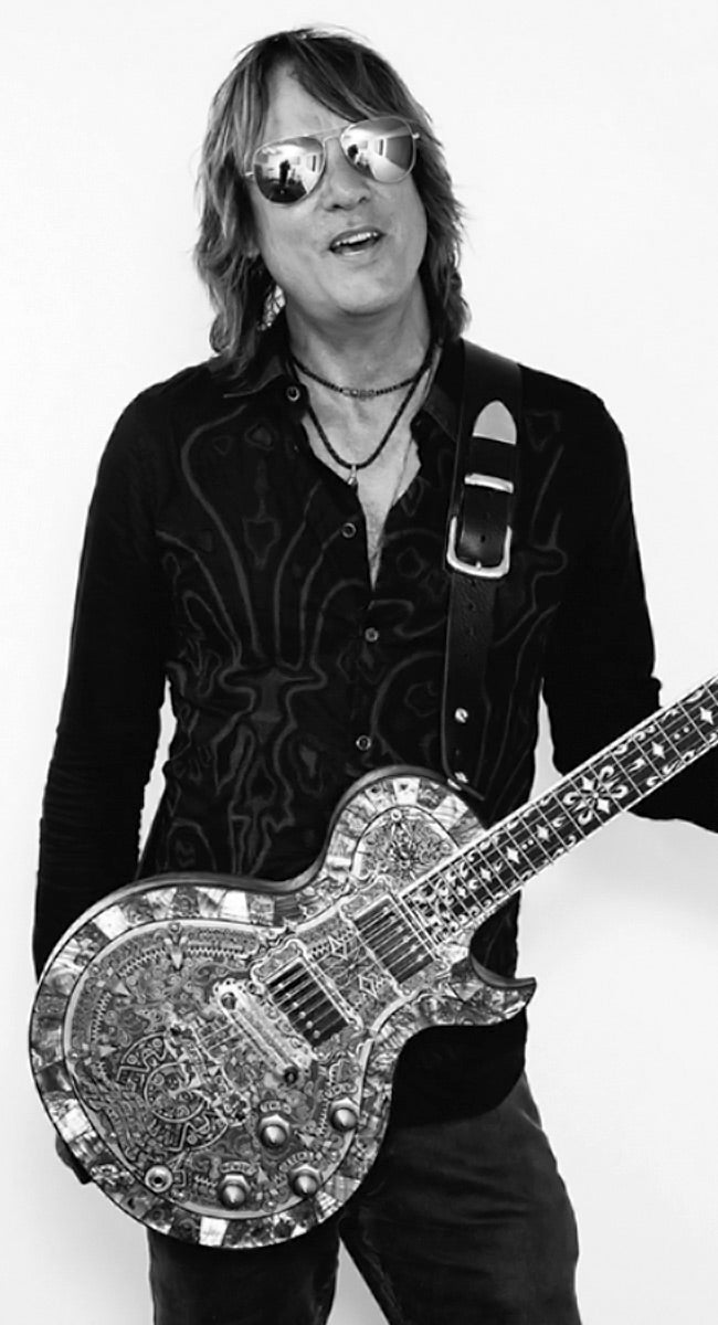 MATT BACKER Playing a TEYE Guitar