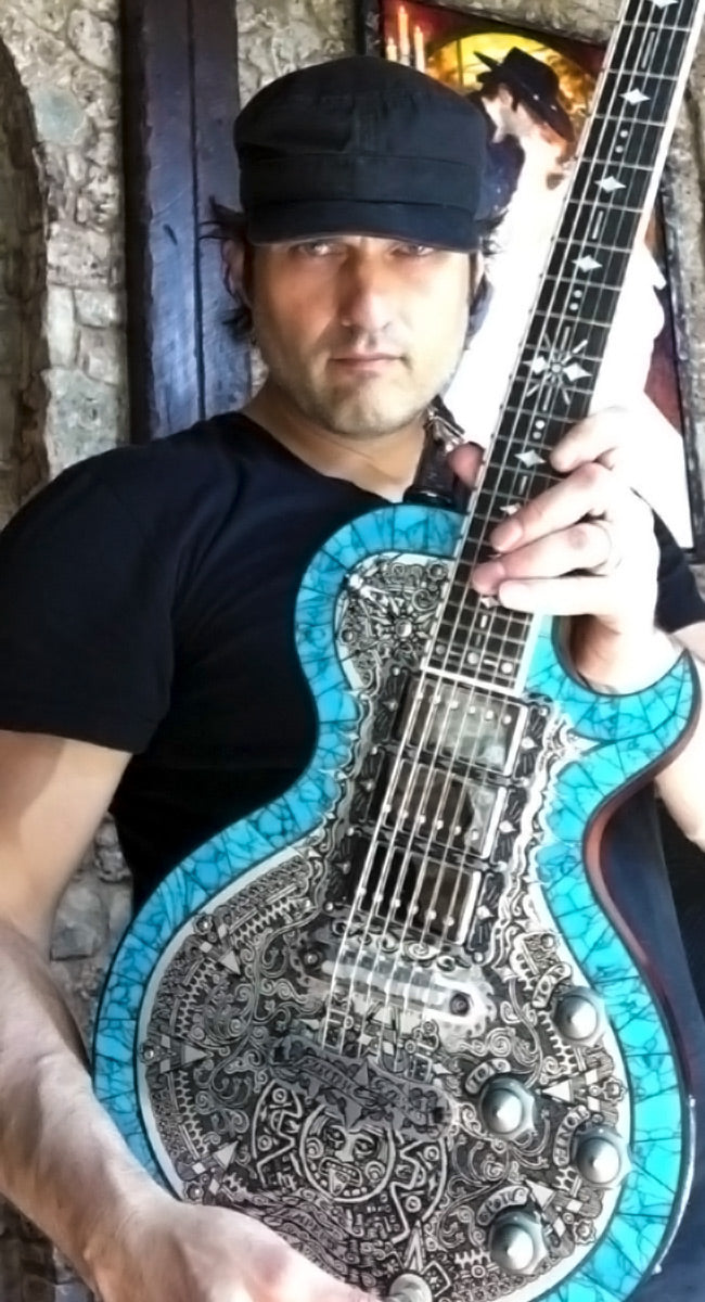 ROBERT RODRIGUEZ Playing a TEYE Guitar